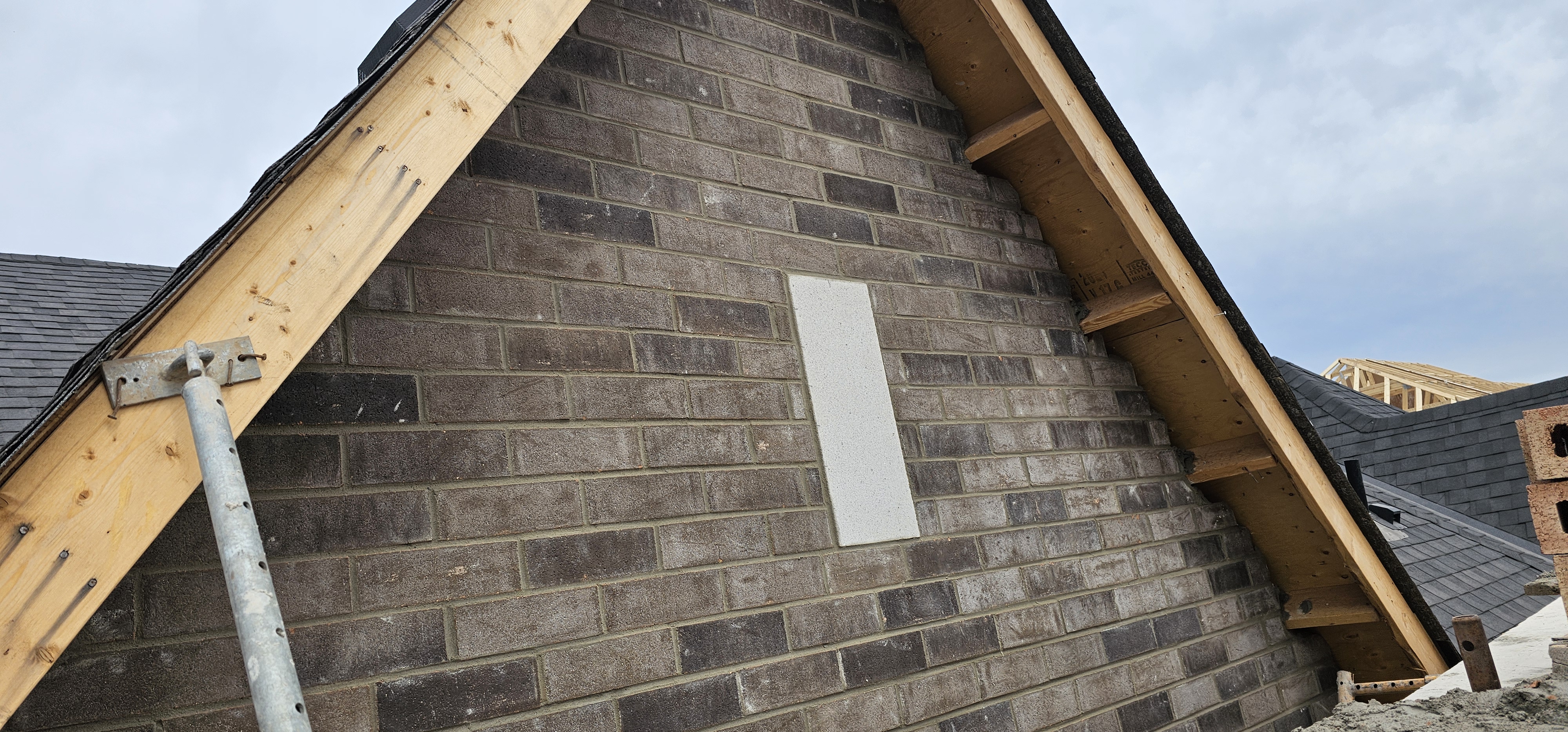 Gable-end brick veneer work in Toronto, GTA