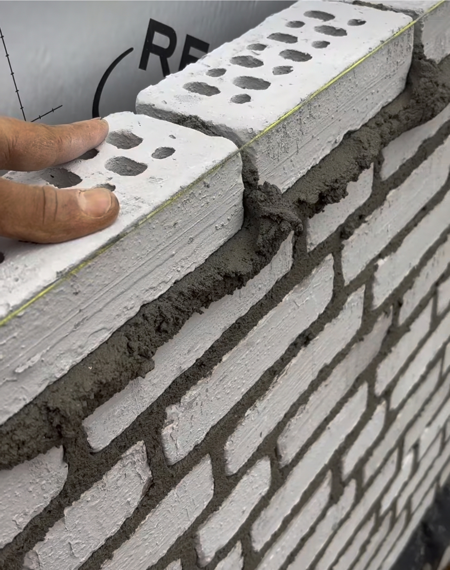 Bricklaying in progress on a veneer wall in Markham, GTA