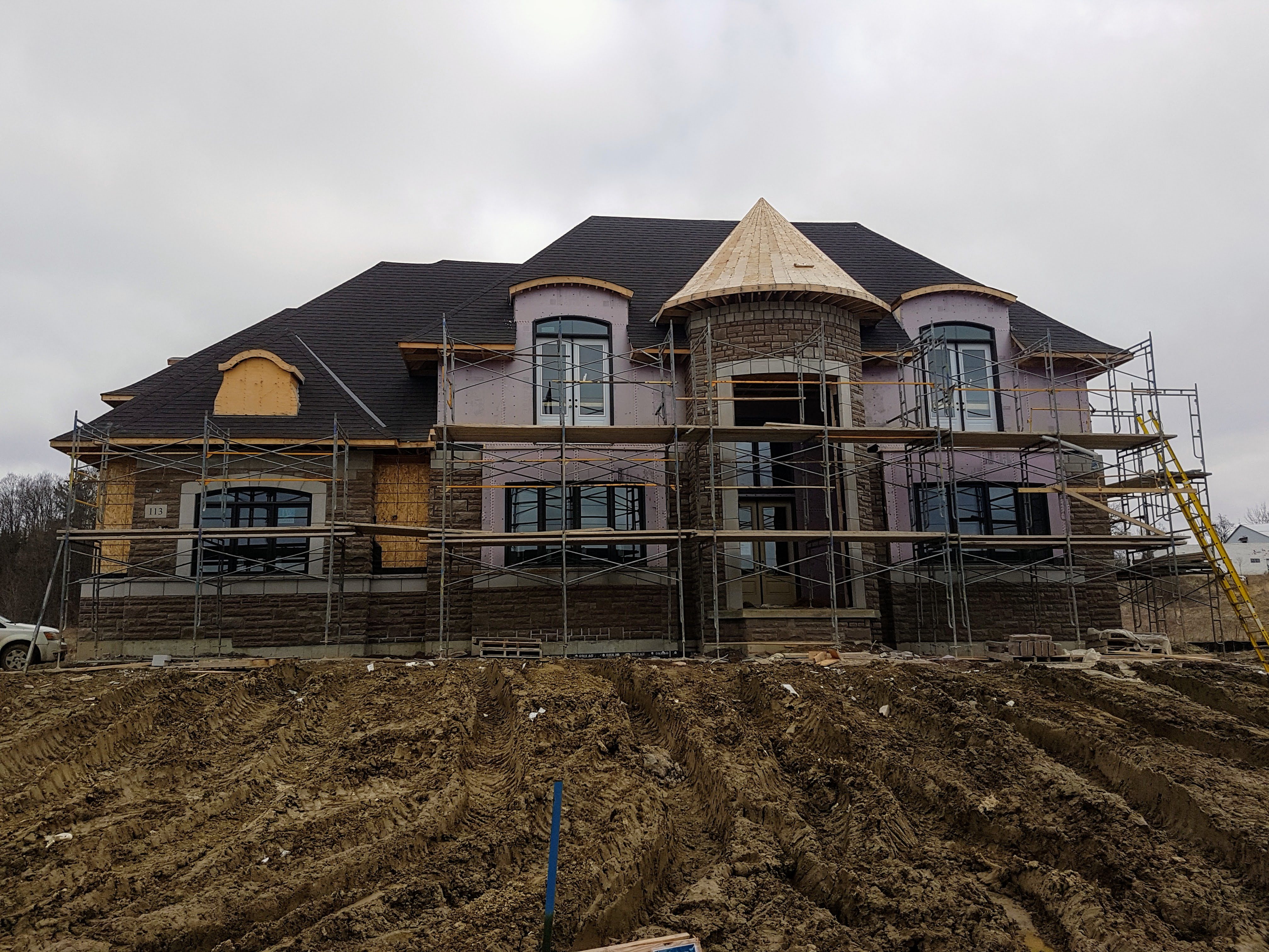 Brick and stone facade on a custom home in Toronto, GTA — Olprrix Services