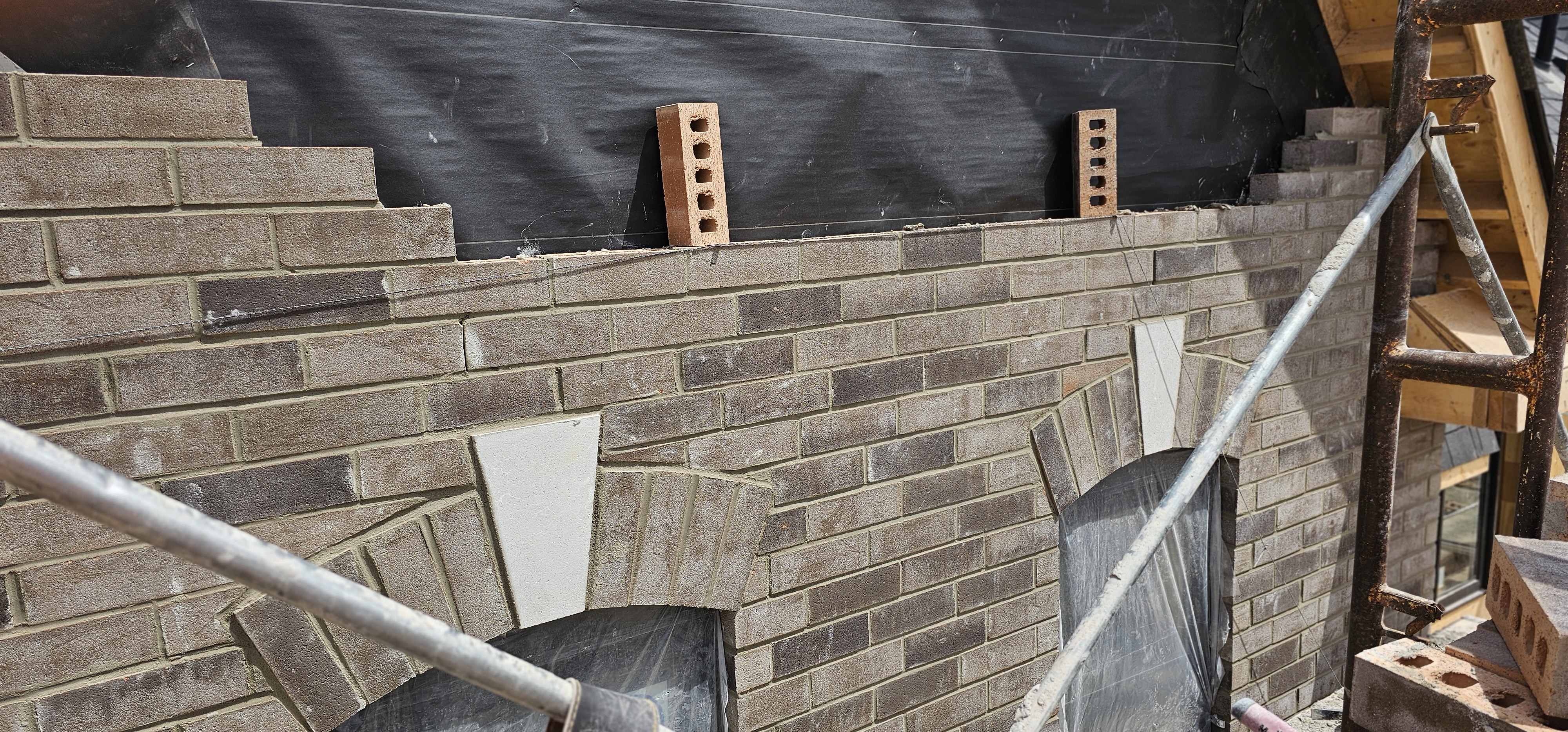 Brickwork with arched window openings in Oakville, GTA